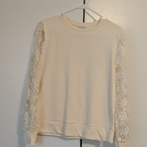 Cream sweater with lace sleeves